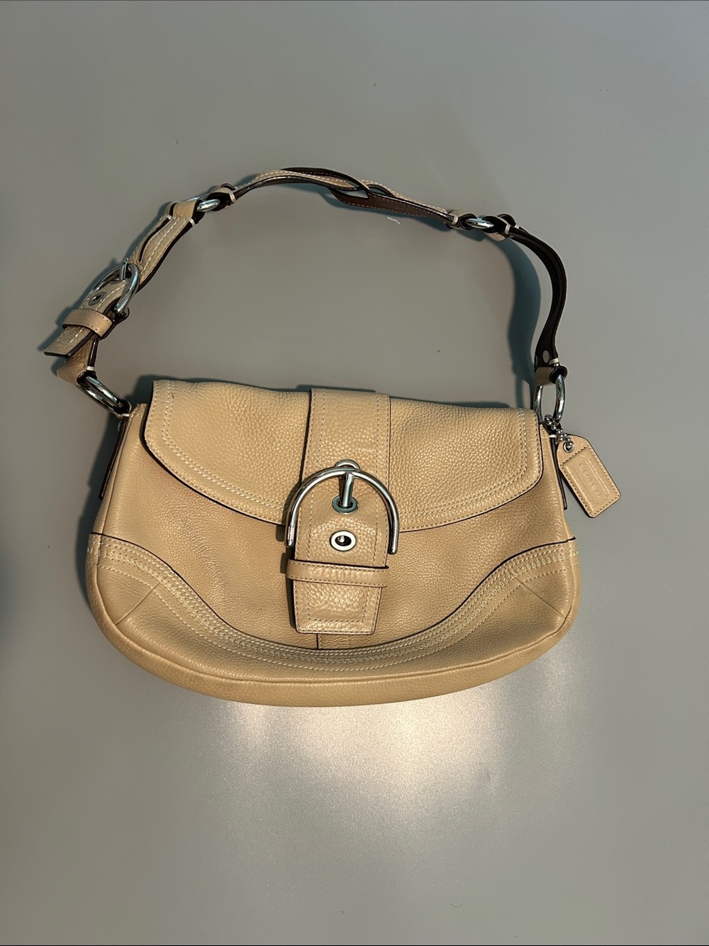Coach Pebble Leather Shoulder Bag in Beige with Buckle Accent
